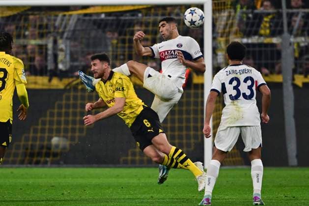 Salih Özcan 6 Borussia Dortmund in duel, action, with Achraf Hakimi 2 Paris , Borussia Dortmund vs Paris Saint Germain, Football, Champions League, Group stage, 13 12 2023 Dortmund Nordrhein Westfalen Germany Copyright: xkolbert-press MarcxNiemeyerx