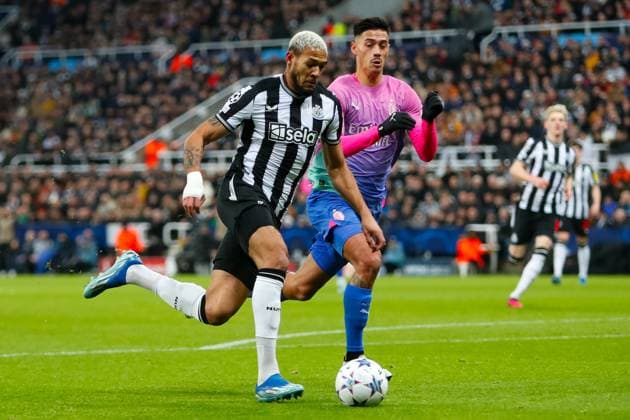 13th December 2023; St James Park, Newcastle, England; UEFA Champions League Football, Newcastle United versus AC Milan; Joelinton of Newcastle United runs at goal under pressure from Tijjani Reijnders of AC Milan  ActionPlus12585485 GrahamxWilson