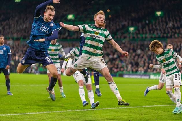 Celtic v Feyenoord Champions League 13 12 2023. Liam Scales of Celtic FC headers the ball away from danger during the Champions League Matchday 6, Celtic FC vs Feyenoord, Celtic Park, Parkhead, Glasgow, 13 12 2023. Editorial use only , Copyright: xColinxPoultneyx PSI-18592-0023