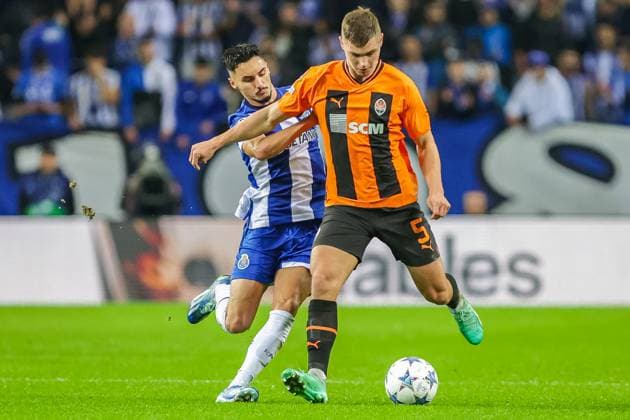 Uefa Champions League, FC Porto vs Shakhtar Donetsk , round 6 of 6 Porto, Portugal, December, 13th, 2023,Uefa Champions League, FC Porto vs Shakhtar Donetsk , round 6 of 6 at the Estadio do Dragao, Valeriy Bondar, playing for Shakhtar Donetsk, vs Stephen Eustaquio, playing for FC Porto, photography by @guelbergoes Porto Portugal