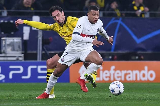 Soccer Champions League group stage matchday 6 Borussia Dortmund Paris Saint Germain on 13 12 2023 at Signal Iduna Park in Dortmund Kylian Mbappe Paris , front Mats Hummels Dortmund , back xRx