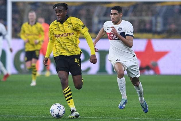 Soccer Champions League group stage matchday 6 Borussia Dortmund Paris Saint Germain on 13 12 2023 at Signal Iduna Park in Dortmund Jamie Jermaine Bynoe Gittens Dortmund , left Achraf Hakimi Paris , right xRx