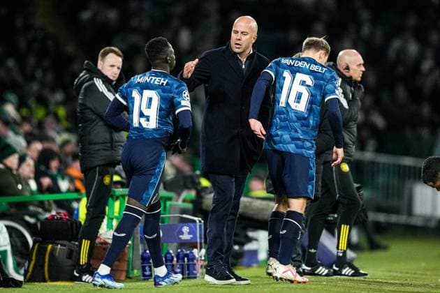 UEFA Champions League: Celtic v Feyenoord Glasgow - Yankuba Minteh of Feyenoord, Feyenoord coach Arne Slot, Thomas van den Belt of Feyenoord during the 6th leg of the UEFA Champions League group stage between Celtic v Feyenoord at Celtic Park on 13 December 2023 in Glasgow, Scotland. Copyright: xTomxBodex