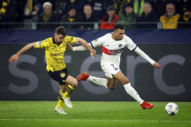 DORTMUND - (l-r) Salih Ozcan of Borussia Dortmund, Kylian Mbappe of Paris Saint-Germain during the UEFA Champions League Group F match between Borussia Dortmund and Paris Saint-Germain at Signal Iduna Park on December 13, 2023 in Dortmund, Germany. ANP Hollandse Hoogte Bart Stoutjesdijk UEFA Champions League 2023 24 2023 2024 xVIxANPxSportx xBartxStoutjesdijkxIVx 486223507 originalFilename: 486223507.jpg