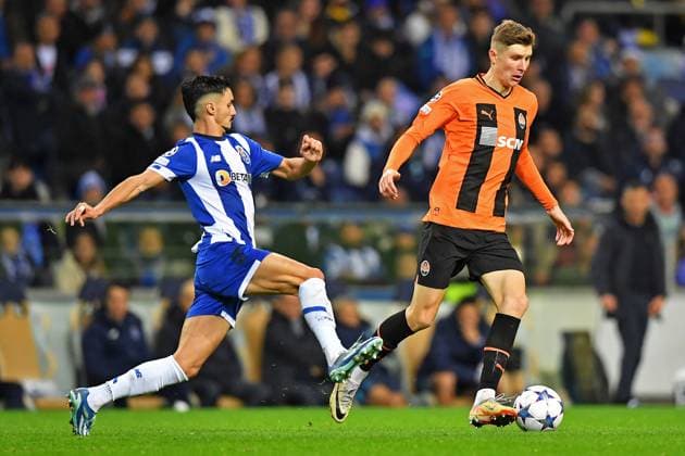 13th December 2023: EUFA Champions League football, FC Porto versus Shakhtar Donetsk: Stephen Eust& xe1;quio of Porto challenges Danylo Sikan of Shakhtar Donetsk  ActionPlus12585516 DanielxCastro