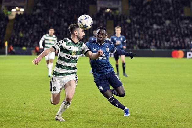 GLASGOW - (l-r) Greg Taylor of Celtic, Yankuba Minteh of Feyenoord during the UEFA Champions League Group E match between Celtic FC and Feyenoord at Celtic Park on December 13, 2023 in Glasgow, Scotland. ANP OLAF KRAAK Group E - UEFA Champions League 2023 2024 xVIxANPxSportx xxANPxIVx 486223577 originalFilename: 486223577.jpg