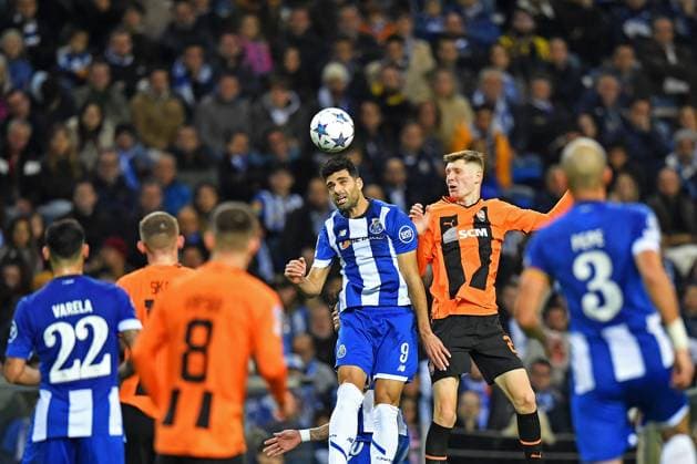13th December 2023: EUFA Champions League football, FC Porto versus Shakhtar Donetsk: Mehdi Taremi of Porto challenges Artem Bondarenko of Shakhtar Donetsk  ActionPlus12585510 DanielxCastro