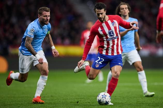 Mario Hermoso of Atletico de Madrid (R) battles for the ball with Ciro Immobile of SS Lazio (L) during the UEFA Champions League match between Atletico Madrid v SS Lazio in Madrid, Spain, on December 13, 2023. FOOTBALL : Atletico Madrid vs SS Lazio - UEFA Ligue des Champions - 13 12 2023 AlvaroMedranda Panoramic 