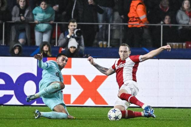 Barcelona s Ferran Torres and Antwerp s Ritchie De Laet pictured in action during a game between Belgian soccer team Royal Antwerp FC and Spanish club FC Barcelona, Barca in Antwerp, on Wednesday 13 December 2023, day six of the Champions League group stage, in group H. TOM GOYVAERTS TomxGoyvaerts  x82280710x