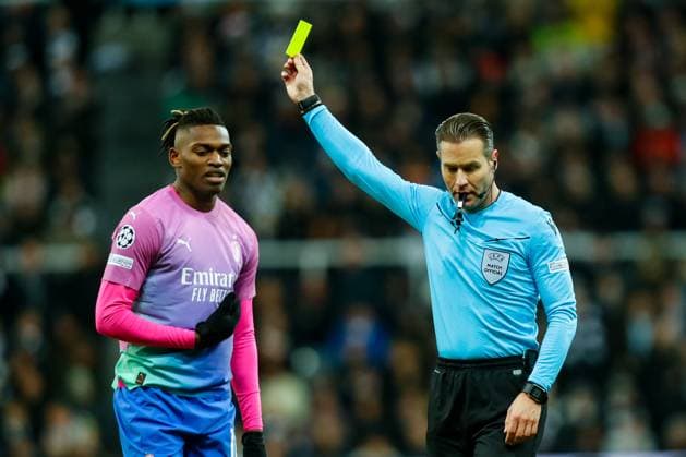 13th December 2023; St James Park, Newcastle, England; UEFA Champions League Football, Newcastle United versus AC Milan; Referee Danny Makkelie shows Rafael Leao of AC Milan a yellow card  ActionPlus12585539 GrahamxWilson