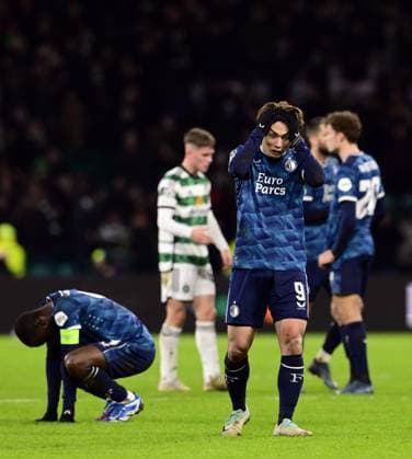 GLASGOW - (l-r) Lutsharel Geertruida of Feyenoord, Ayase Ueda of Feyenoord disappointment after the UEFA Champions League Group E match between Celtic FC and Feyenoord at Celtic Park on December 13, 2023 in Glasgow, Scotland. ANP OLAF KRAAK Group E - UEFA Champions League 2023 2024 xVIxANPxSportx xxANPxIVx 486227294 originalFilename: 486227294.jpg