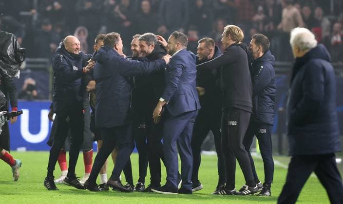 Antwerp s head coach Mark van Bommel celebrates after winning a game between Belgian soccer team Royal Antwerp FC and Spanish club FC Barcelona, Barca in Antwerp, on Wednesday 13 December 2023, day six of the Champions League group stage, in group H. VIRGINIExLEFOUR  x82282439x