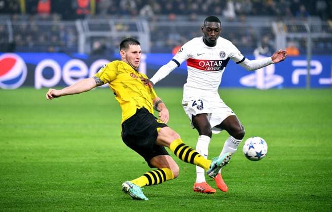 Football, Champions League, Germany, Men, Season 2023 2024, Matchday 6, Signal Iduna Park Dortmund Bor Dortmund FC Paris Saint Germain 1 1 Niklas Süle BVB , Randal Kolo Muani PSG Action UEFA REGULATES PROHIBIT ANY USE OF PHOTOGRAPHS AS IMAGE SEQUENCES AND OR QUASI VIDEO