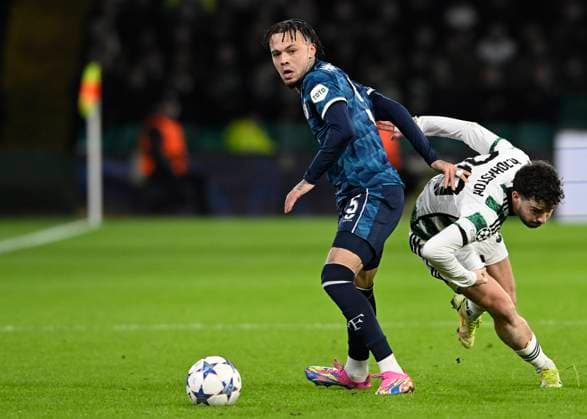 Glasgow, Scotland, 13th December 2023. Quilindschy Hartman of Feyenoord and Mikey Johnston of Celtic during the UEFA Champions League match at Celtic Park, Glasgow. Picture credit should read: Neil Hanna Sportimage EDITORIAL USE ONLY. No use with unauthorised audio, video, data, fixture lists, club league logos or live services. Online in-match use limited to 120 images, no video emulation. No use in betting, games or single club league player publications. SPI-2799-0027