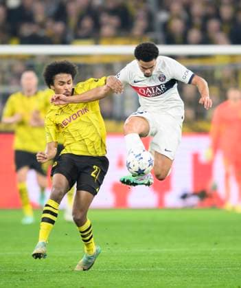 v l Karim David ADEYEMI DO , Warren ZAIRE EMERY PSG action, duel, Football Champions League, preliminary round, matchday 6, Borussia Dortmund DO Paris St Germain PSG , on 13 12 2023 in Dortmund Germany UEFA regulations prohibit any use of photographs as image sequences and or quasi video Â