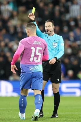 Newcastle United v AC Milan Champions League 13-12-2023. Luka Jovic (15) of AC Milan is shown a yellow card during the Champions League match between Newcastle United and AC Milan at St. James s Park, Newcastle, England on 13 December 2023. Newcastle St. James s Park Tyne and Wear England Editorial use only , Copyright: xStephenxDobsonx PSI-18596-0154