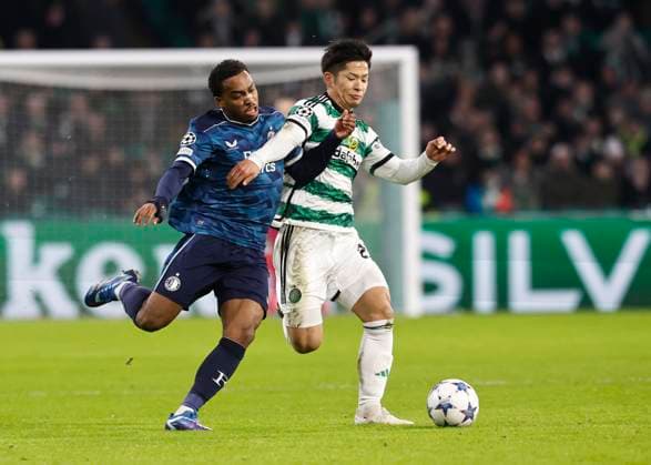 Celtic v Feyenoord Rotterdam UEFA Champions League Quinten Timber of Feyenoord Rotterdam (left) and Tomoki Iwata of Celtic (right) compete for the ball during the UEFA Champions League Group E match at Celtic Park, Glasgow Copyright: xFredxPalmerx FIL-19372-0089 UK Newspapers OUT
