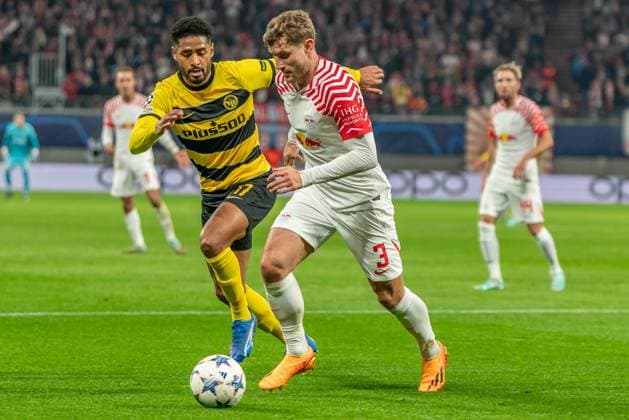 Leipzig, Germany 13 December 2023 Champions League 2023 2024 RB Leipzig vs Young Boys Bern Pictured from left in a duel Saidy Janko Bern and Christopher Lenz Leipzig Copyright: xFotostandx xNachtigallx
