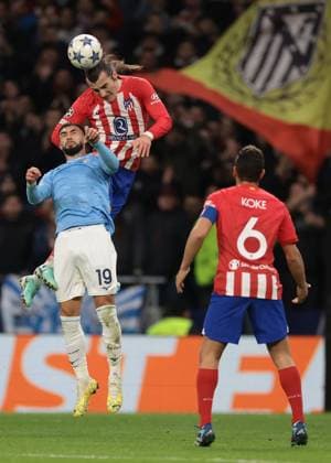Madrid, Spain, 13th December 2023. Koke of Atletico Madrid looks on as team mate Calgary Soyuncu heads clear from Taty Castellanos of SS Lazio during the UEFA Champions League match at Civitas Metropolitan Stadium, Madrid. Picture credit should read: Jonathan Moscrop Sportimage EDITORIAL USE ONLY. No use with unauthorised audio, video, data, fixture lists, club league logos or live services. Online in-match use limited to 120 images, no video emulation. No use in betting, games or single club league player publications. SPI-2787-0079