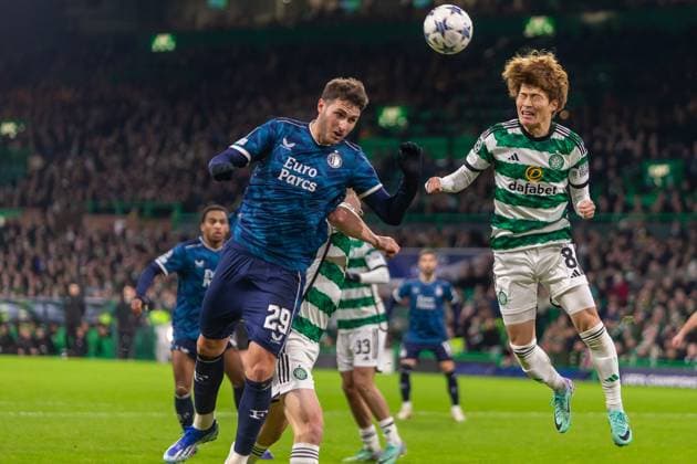 Kyogo Furuhashi of Celtic FC headers the ball clear from a corner during the Champions League Match day 6, Celtic FC vs Feyenoord, Celtic Park, Parkhead, Glasgow, December 12 2023. Noxthirdxpartyxsales  (238326236)