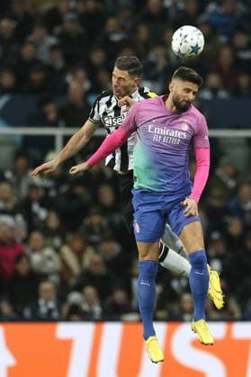 Newcastle United FC v AC Milan: Group F - UEFA Champions League 2023 24 Fabian Schar of Newcastle United and Olivier Giroud of AC Milan are going for the ball during the UEFA Champions League Group F match between Newcastle United and Associazione Calcio Milan at St. James s Park in Newcastle, on December 13, 2023. Newcastle Tyne and Wear United Kingdom  Copyright: xMIxNewsx originalFilename:fletcher-newcastl231213_npmib.jpg