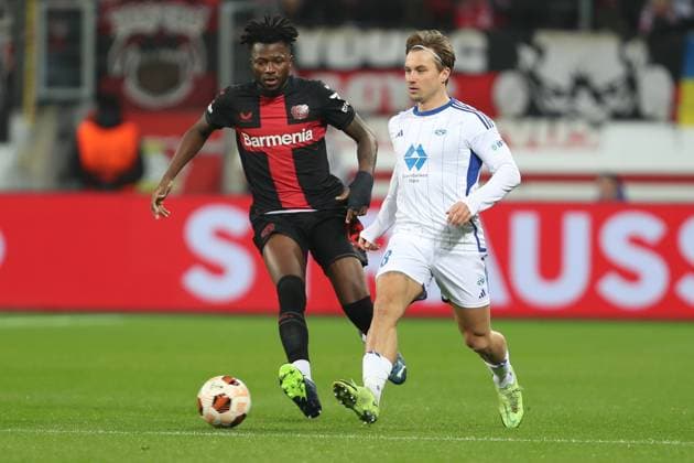 Germany, Leverkusen, 14 12 2023, BayArena, Bayer Leverkusen vs Molde FK UEFA Europa League 2023 2024 Group H, Edmond Tapsoba Bayer 04 Leverkusen and Fredrik Gulbrandsen Molde FK battle for the ball Leverkusen BayArena North Rhine Westfalia Germany eu-images-678