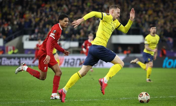 Union s Gustaf Nilsson fights for the ball during a game between Belgian soccer team Royale Union Saint Gilloise and English club Liverpool FC, on Thursday 14 December 2023 in Brussels, on the sixth and last day of the group phase of the UEFA Europa League competition, in group E. VIRGINIExLEFOUR  x82339055x