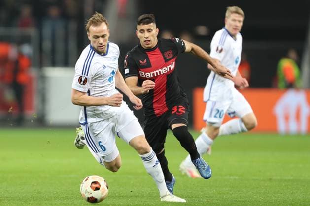 Germany, Leverkusen, 14 12 2023, BayArena, Bayer Leverkusen vs Molde FK UEFA Europa League 2023 2024 Group H, Martin Ellingsen Molde FK and Gustavo Puerta Bayer 04 Leverkusen battle for the ball Leverkusen BayArena North Rhine Westfalia Germany eu-images-678