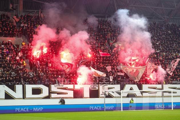 SOCCER - UEFA EL, LASK vs Toulouse LINZ,AUSTRIA,14.DEC.23 - SOCCER - UEFA Europa League, group stage, Linzer ASK vs Toulouse FC. Image shows a feature with the fans of LASK. Keywords: bengal fire.  GEPAxpictures xManuelxBinder