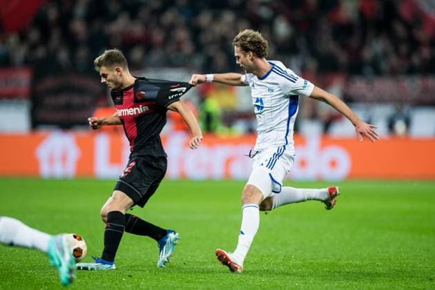 UEFA Europa League Bayer 04 Leverkusen Molde FK 14 12 2023 Josip Stanisic Bayer 04 Leverkusen, 2 , Magnus Grodem Molde FK, 22 pulls on jersey UEFA Europa League Matchday 6 Bayer 04 Leverkusen 1Molde FK, BayArena Leverkusen on 14 12 2023 DFL REGULATIONS PROHIBIT ANY USE OF PHOTOGRAPHS AS IMAGE SEQUENCES AND OR QUASI VIDEO Copyright: xBEAUTIFULxSPORTS Wunderlx