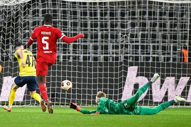 Union s Mohamed Amoura scores a goal during a game between Belgian soccer team Royale Union Saint Gilloise and English club Liverpool FC, on Thursday 14 December 2023 in Brussels, on the sixth and last day of the group phase of the UEFA Europa League competition, in group E. LAURIExDIEFFEMBACQ  x82339940x