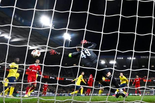 Union SG v Liverpool FC - UEFA Europa League BRUSSELS, BELGIUM - DECEMBER 14 : Quansah Jarell defender of Liverpool scores a goal against Moris Anthony goalkeeper of Union St-Gilloise during the UEFA Europa League Group E match between Union SG and Liverpool at the Anderlecht stadium on December 14, 2023 in Brussels, Belgium, 14 12 2023 Brussels Belgium  Copyright: xPeterxDexVoechtx