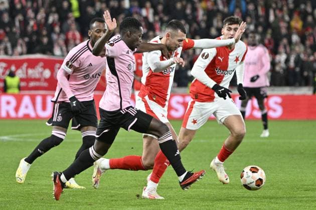 (L-R) Gael Ondoua and Bradley Mazikou of Servette, Ivan Schranz and Mojmir Chytil of Slavia during the UEFA Europa League 6th round Group G football match Slavia Praha vs Servette Geneva in Prague, Czech Republic, December 14, 2023. (CTKxPhoto VitxSimanek) CTKPhotoP2023121407639  CTKPhotoP2023121407639