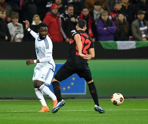 14 12 2023, Leverkusen, Germany, BayARENA, Bayer Leverkusen vs Molde FK UEFA Europa League 2023 2024 Group H, Eric Kitolano Molde FK and Gustavo Puerta Bayer 04 Leverkusen in a duel Photo Ralf Treese Leverkusen BayARENA North Rhine Westphalia Germany 521_LEVMOL20231214_014 Treese-521
