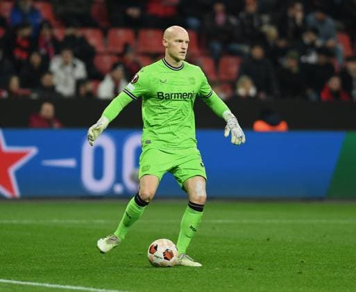 14 12 2023, Leverkusen, Germany, BayARENA, Bayer Leverkusen vs Molde FK UEFA Europa League 2023 2024 Group H, Goalkeeper Niklas Lomb Bayer 04 Leverkusen in action, on the ball, single action Photo Ralf Treese Leverkusen BayARENA North Rhine Westphalia Germany 521_LEVMOL20231214_027 Treese-521