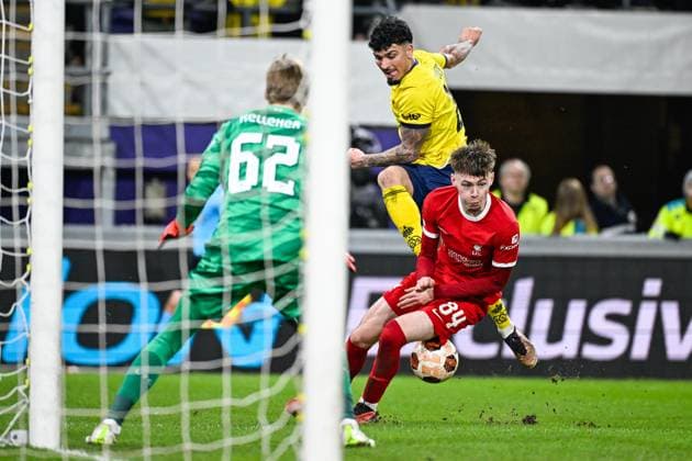 Union s Cameron Puertas Castro and Liverpool s Conor Bradley fight for the ball during a game between Belgian soccer team Royale Union Saint Gilloise and English club Liverpool FC, on Thursday 14 December 2023 in Brussels, on the sixth and last day of the group phase of the UEFA Europa League competition, in group E. LAURIExDIEFFEMBACQ  x82342628x