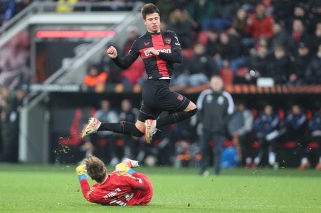 Germany, Leverkusen, 14 12 2023, BayArena, Bayer Leverkusen vs Molde FK UEFA Europa League 2023 2024 Group H, Adam Hlozek Bayer 04 Leverkusen and goalkeeper Oliver Petersen Molde FK battle for the ball Leverkusen BayArena North Rhine Westfalia Germany eu-images-678