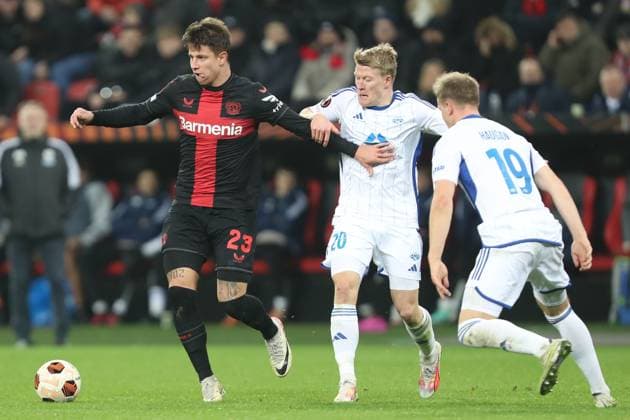 Germany, Leverkusen, 14 12 2023, BayArena, Bayer Leverkusen vs Molde FK UEFA Europa League 2023 2024 Group H, Adam Hlozek Bayer 04 Leverkusen and Kristian Eriksen Molde FK battle for the ball Leverkusen BayArena North Rhine Westfalia Germany eu-images-678