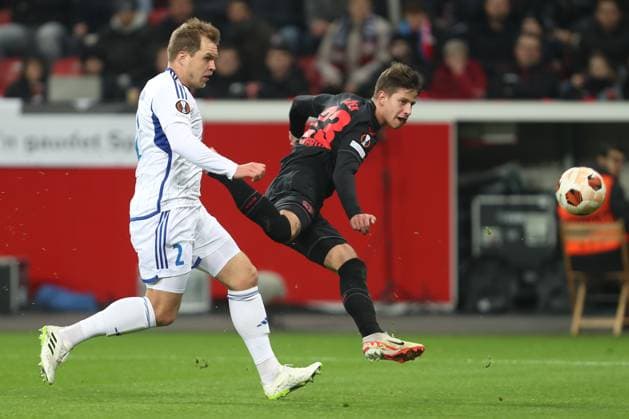 Germany, Leverkusen, 14 12 2023, BayArena, Bayer Leverkusen vs Molde FK UEFA Europa League 2023 2024 Group H, Martin Bjornbak Molde FK and Adam Hlozek Bayer 04 Leverkusen battle for the ball Leverkusen BayArena North Rhine Westfalia Germany eu-images-678