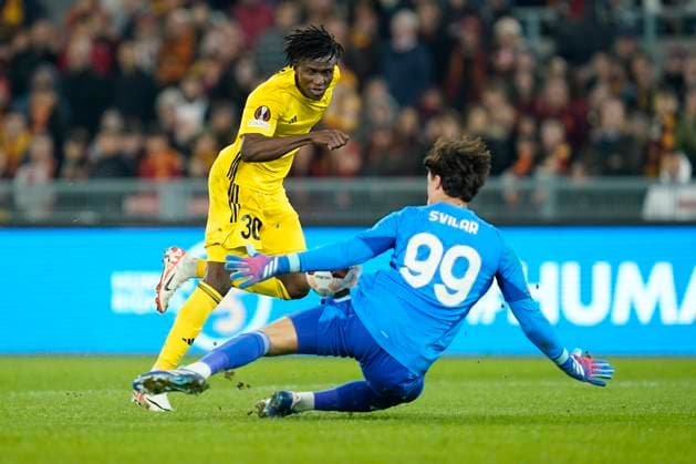 Mile Svilar of AS Roma saving a shot on David Ankeye of FC Sheriff Tiraspol during the UEFA Europa League match between AS Roma and FC Sheriff Tiraspol at Stadio Olimpico Rome Italy on 14 December 2023. Rome Stadio Olimpico Rome Italy Copyright: xPhotoxSportxPicsx SP24-786-030