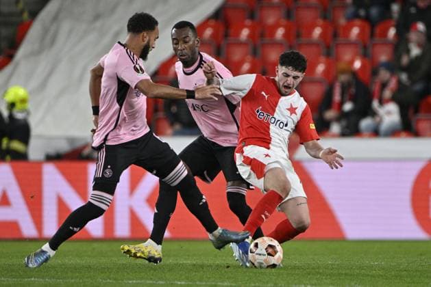 (L-R) Anthony Baron and Miroslav Stevanovic of Servette and Christos Zafeiris of Slavia in action during the UEFA Europa League 6th round Group G football match Slavia Praha vs Servette Geneva in Prague, Czech Republic, December 14, 2023. (CTKxPhoto VitxSimanek) CTKPhotoP2023121408316  CTKPhotoP2023121408316