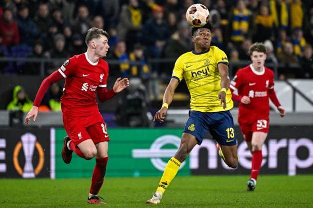 Liverpool s Conor Bradley and Union s Kevin Rodriguez fight for the ball during a game between Belgian soccer team Royale Union Saint Gilloise and English club Liverpool FC, on Thursday 14 December 2023 in Brussels, on the sixth and last day of the group phase of the UEFA Europa League competition, in group E. LAURIExDIEFFEMBACQ  x82344652x