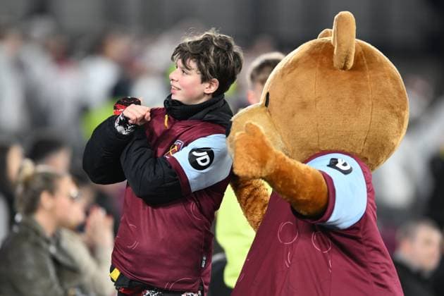 A young West Ham United supporter during the UEFA Europa League match between West Ham United and SC Freiburg at the London Stadium, Queen Elizabeth Olympic Park , London, England on 14 December 2023. Copyright: xPhilxHutchinsonx 39240001