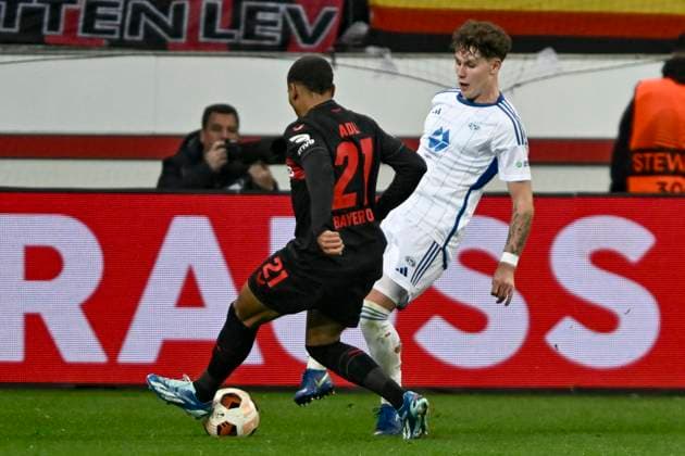 from left in duel Amine Adli 21, Bayer Leverkusen Martin Linnes 21, Molde FK 14 12 2023 Soccer Europa League, Bayer 04 Leverkusen vs Molde FK, BayArena, Leverkusen, NRW Germany Copyright: xpepphotox xHorstxMauelshagenx pep00321, pep_20231214_hm