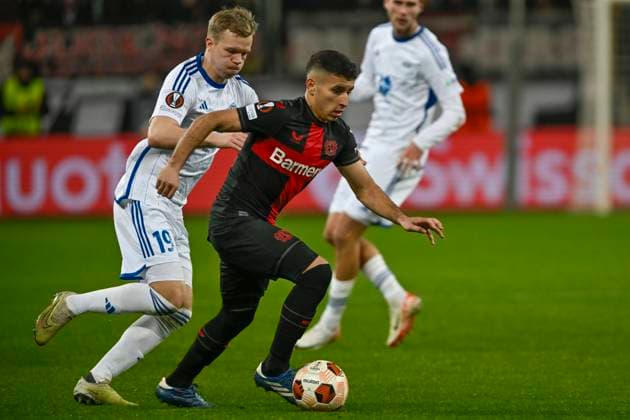 from left in duel Eirik Haugan 19, Molde FK Gustavo Puerta 32, Bayer Leverkusen 14 12 2023 Soccer Europa League, Bayer 04 Leverkusen vs Molde FK, BayArena, Leverkusen, NRW Germany Copyright: xpepphotox xHorstxMauelshagenx pep00321, pep_20231214_hm