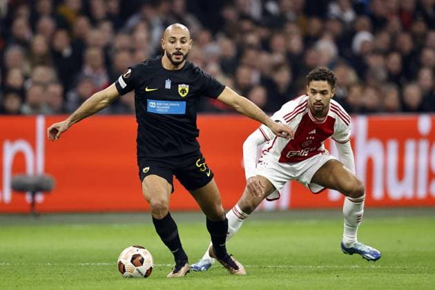 AMSTERDAM - (l-r) Nordin Amrabat of AEK Athens, Devyne Rensch of Ajax, during the UEFA Europa League Group B match between Ajax Amsterdam and AEK Athene FC at the Johan Cruyff ArenA on December 14, 2023 in Amsterdam, Netherlands. ANP MAURICE VAN STEEN UEFA Europa League 2023 24 2023 2024 xVIxANPxSportx xxANPxIVx 486302440 originalFilename: 486302440.jpg