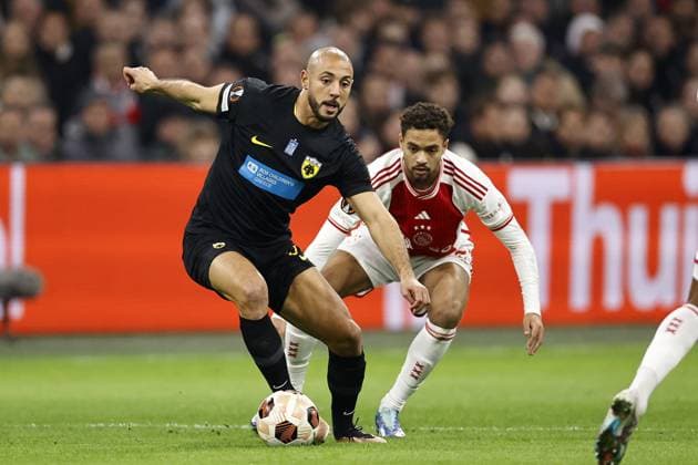 AMSTERDAM - (l-r) Nordin Amrabat of AEK Athens, Devyne Rensch of Ajax during the UEFA Europa League Group B match between Ajax Amsterdam and AEK Athene FC at the Johan Cruyff ArenA on December 14, 2023 in Amsterdam, Netherlands. ANP MAURICE VAN STEEN UEFA Europa League 2023 24 2023 2024 xVIxANPxSportx xxANPxIVx 486303508 originalFilename: 486303508.jpg