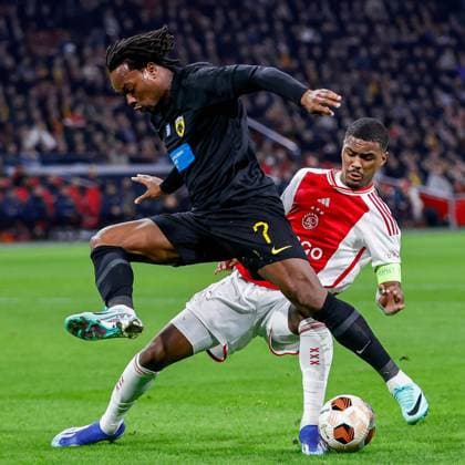 AMSTERDAM, 14-12-2023 , JohanCruyff Arena, Europa League Football season 2023 2024. AEK Athene player Levi Garcia (l) with Ajax player Jorrel Hato (r) during the match Ajax - AEK Athens. Ajax - AEK Athens  x23520900x Copyright: