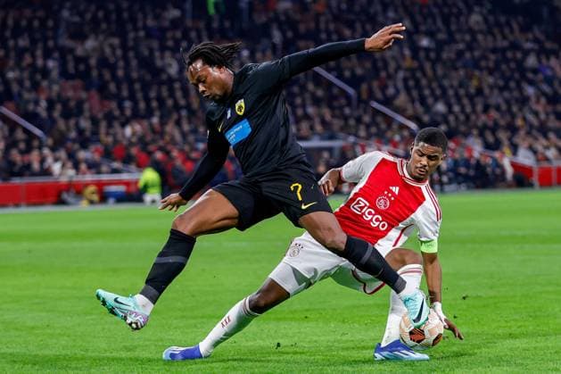 AMSTERDAM, 14-12-2023 , JohanCruyff Arena, Europa League Football season 2023 2024. AEK Athene player Levi Garcia (l) with Ajax player Jorrel Hato (r) during the match Ajax - AEK Athens. Ajax - AEK Athens  x23520901x Copyright: