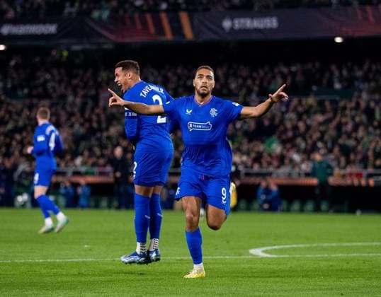 Rangers Forward Cyriel Dessers celebrates scoring his sides second goal during the Europa League Group C match at the Estadio Benito Villamarin, Seville. Real Betis v Rangers, UEFA Europa League, Group C, Football, Benito VillamaroÆ?Ã?Ân Stadium, Seville, Spain - 14 Dec 2023 EDITORIAL USE ONLY No use with unauthorised audio, video, data, fixture lists, club league logos or live services. Online in-match use limited to 120 images, no video emulation. No use in betting, games or single club league player publications. Copyright: xKirkxO Rourke RangersxFC Shutterstockx 14257803bp